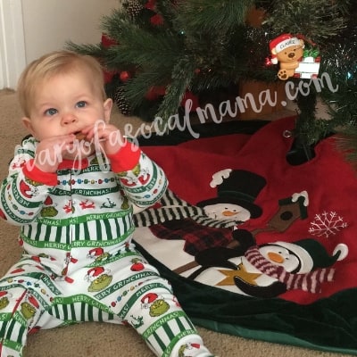 Christmas baby photo in front of tree