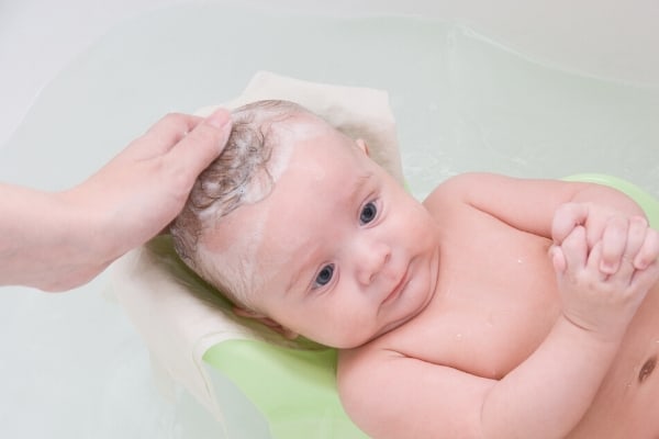 washing baby's head for cradle cap